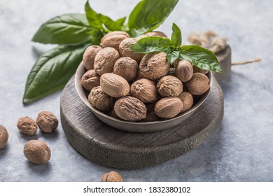 Whole Nutmeg Nuts In A Bowl
