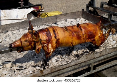Whole pig of roasting on a spit