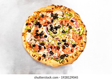 whole pizza from top with veggies - Powered by Shutterstock