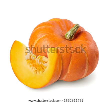 Whole pumpkin and slice of pumpkin isolated on white background.