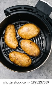 Whole Raw Golden Potatoes In An Air Fryer