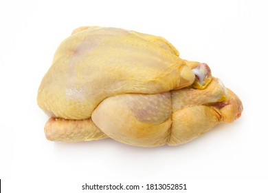 whole raw guinea fowl isolated on a white background