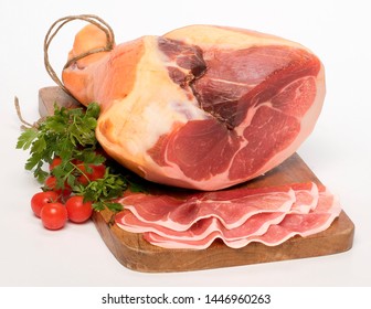 Whole Raw Ham On Wooden Cutting Board