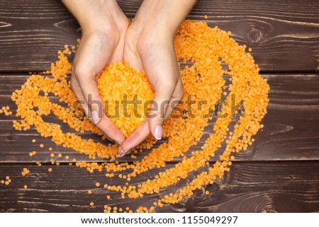 Similar – Image, Stock Photo Red organic lentils on a blackboard