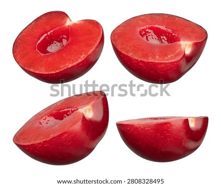 Whole Red Cherry with Half and Pit Isolated on White