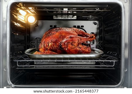 Whole roast turkey in the oven