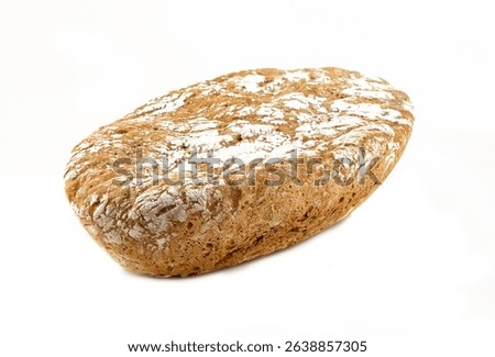 Whole rustic round loaf of rye bread with flour crust isolated on white background, traditional artisan homemade bread, healthy organic bakery product close-up