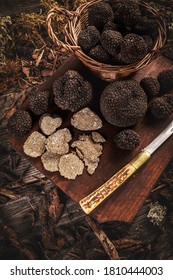 Whole And Slice Of Delicacy Black Truffles Mushroom