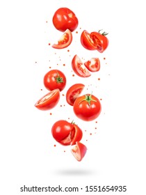 Whole And Sliced Fresh Tomatoes In The Air On A White Background