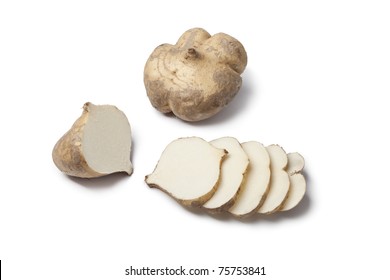 Whole And Sliced Jicama Isolated On White Background