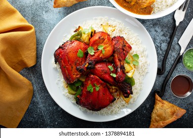 Whole tandoori chicken with jasmine rice, indian food