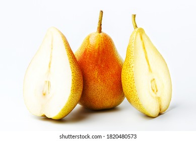 Whole and two half  pears on an isolated background. Big plan. - Shutterstock ID 1820480573