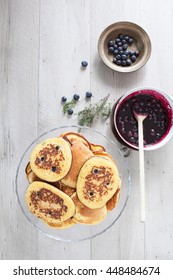 Whole Wheat Blueberry Pancakes On Cake Stand, Flavored With Fresh Thyme And Served With Blueberries Jam.