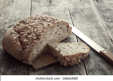 Whole wheat bread on table, close up