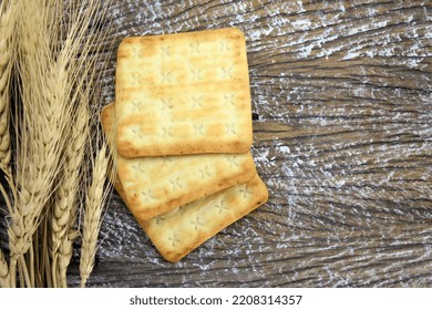 whole wheat cracker and broken crushed with dried barley plant  - Shutterstock ID 2208314357