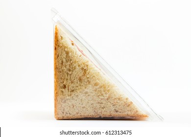 Whole Wheat Sandwich Toast With Ham And Cheese In A Plastic Box Isolated On White Background