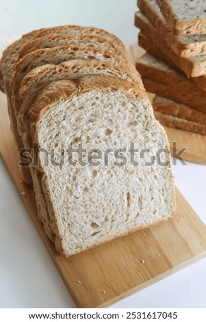 Image, Stock Photo Rustic bread on wooden table