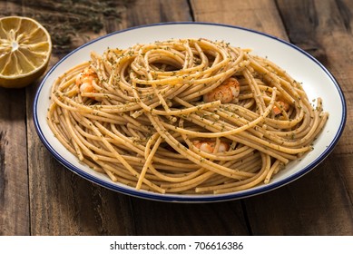 Whole Wheat Spaghetti With Shrimp On Wood