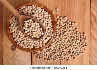 Whole Yellow Peas In Wooden Bowl