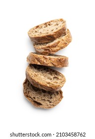 Wholegrain ciabatta bread. Sliced baked baguette isolated on white background.