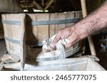 wholegrain flower being milled with watermill