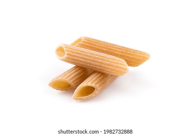 Wholemeal Pasta Penne as close-up shot isolated on white background - Shutterstock ID 1982732888