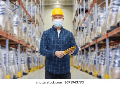 Wholesale, Logistic, People And Export Concept - Male Worker In Safety Helmet Wearing Face Protective Medical Mask Over Warehouse Background