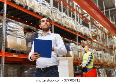 wholesale, logistic, people and export concept - businessman with clipboards at warehouse - Powered by Shutterstock