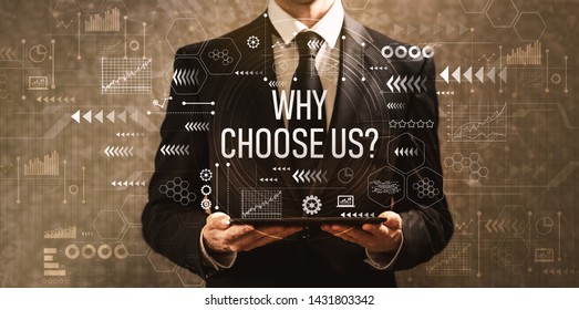 Why choose us with businessman holding a tablet computer on a dark vintage background - Shutterstock ID 1431803342
