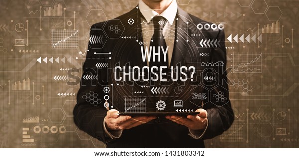 Why choose us with businessman holding\
a tablet computer on a dark vintage\
background