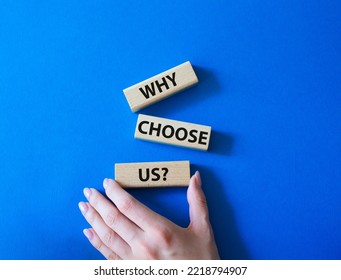 Why choose us symbol. Concept words Why choose us on wooden blocks. Beautiful blue background. Businessman hand. Business and Why choose us concept. Copy space. - Shutterstock ID 2218794907