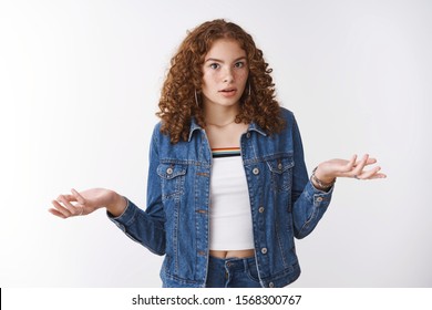 Why so fuss. Pressured displeased teenage girl standing clueless shocked shrugging hands sideways dismay widen eyes pissed irritated arguing, quarrel parents cannot understand what happened