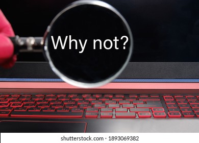 Why Not A Question In White Font On A Black Monitor Background Through A Magnifying Glass.
