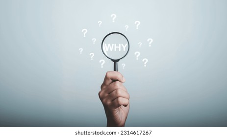 Why question in magnifying and question mark be around, What is your reason concept. Business answer and analysis, problem ask, interrogation, research information with copy space on grey background.