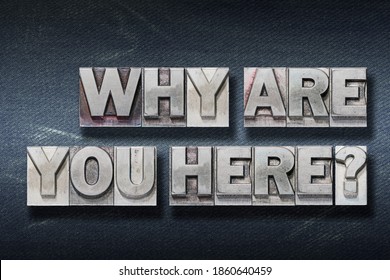 why are you here question made from metallic letterpress on dark jeans background
