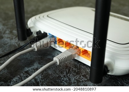 Wi - fi router and connection cables, close up