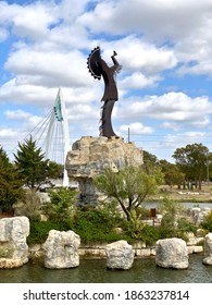 Wichita, Kansas - 2020: The Keeper of the Plains is a 44-foot, 5-ton weathered steel sculpture by Kiowa-Comanche artist Blackbear Bosin at the confluence of the Arkansas and Little Arkansas rivers. 