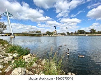 Wichita, Kansas - 2020: The Keeper Of The Plains Is A 44-foot, 5-ton Weathered Steel Sculpture By Kiowa-Comanche Artist Blackbear Bosin At The Confluence Of The Arkansas And Little Arkansas Rivers. 