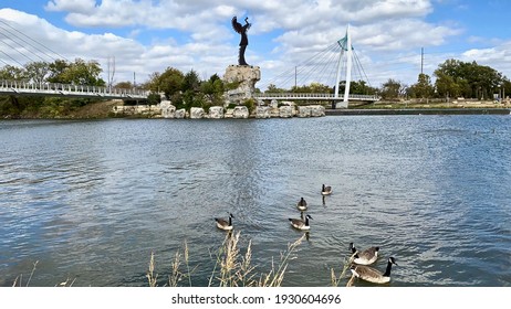 Wichita, Kansas - 2020: The Keeper Of The Plains Is A 44-foot, 5-ton Weathered Steel Sculpture By Kiowa-Comanche Artist Blackbear Bosin At The Confluence Of The Arkansas And Little Arkansas Rivers.