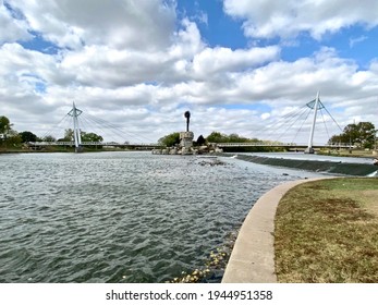 Wichita, Kansas - 2020: The Keeper Of The Plains Is A 44-foot, 5-ton Weathered Steel Sculpture By Kiowa-Comanche Artist Blackbear Bosin At The Confluence Of The Arkansas And Little Arkansas Rivers.