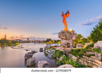 WICHITA, KANSAS - AUGUS 31, 2018: The confluence of the Arkansas and Little Arkansas River at the Keeper of the Plains near downtown Wichita at dawn. 