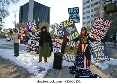 Wichita, Kansas, USa, 17th November, 2014
Members of the Westboro Baptist Church protest outside the Sedgwich County Courthouse prior to the weddings of 20 same-sex couples on the courthouse steps.
 