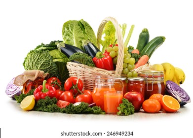Wicker basket with assorted organic vegetables and fruits  isolated on white - Shutterstock ID 246949234