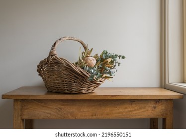 Wicker Basket With Australia Native Flowers And Eucalyptus Leave