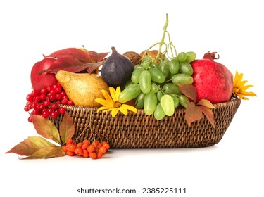 Wicker basket with different fresh fruits and flowers on white background - Powered by Shutterstock