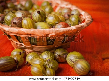 Similar – Image, Stock Photo Top view of organic gooseberries in a vintage bowl