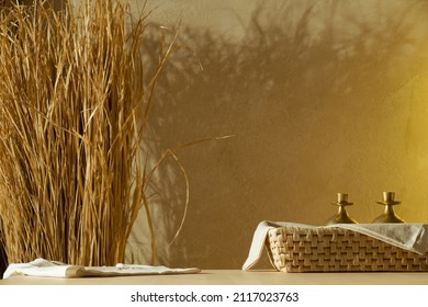 Wicker Basket, Metal Bowls On A Wooden Kitchen Table. Zero Waste Background. Kitchen Interior, Boho Style.