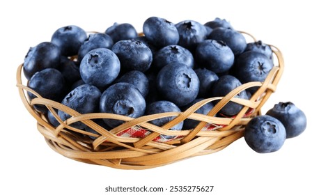 Wicker basket overflowing with freshly picked blueberries on a white background - Powered by Shutterstock