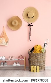 Wicker Basket And Stand With Shoes In Hall