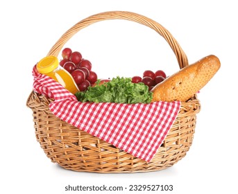 Wicker basket with tasty food for picnic and juice on white background - Powered by Shutterstock